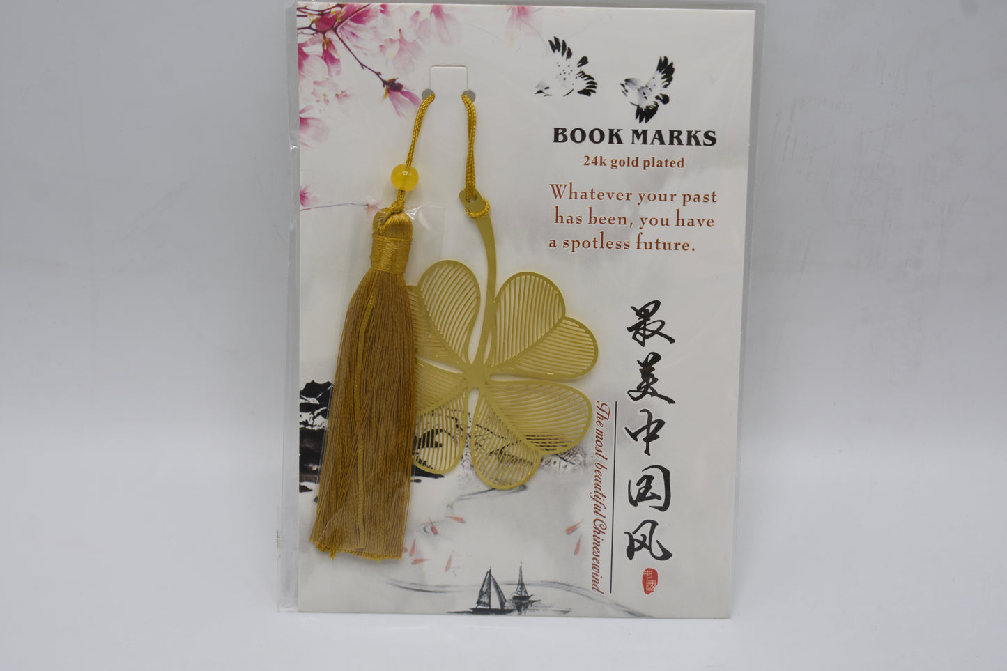 Leave shape metal bookmark with tassel